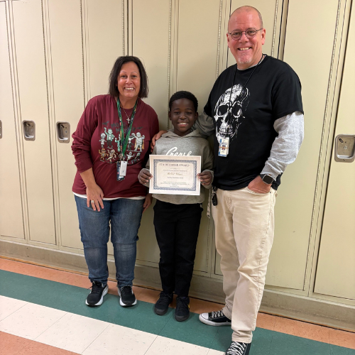 Robert Gilmer, Harding's Stairclimber for October, poses with his award plaque.